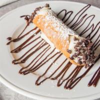 Cannoli · Tubed-shaped Italian pastry filled with sweet Ricotta cheese and chocolate chips.