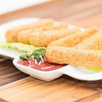 Mozzarella Sticks · 8 pieces. Served with marinara sauce on the side.