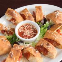 Pepperoni Rolls · Pepperoni, pizza sauce and Parmesan cheese rolled up in strips of our famous pizza dough and...