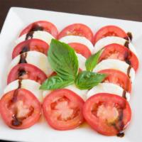 Caprese Salad · A true Italian salad made with fresh mozzarella, fresh basil, tomatoes and extra virgin oliv...