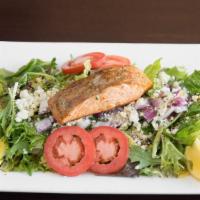 Salmon Salad · Grilled salmon fillets served over mixed greens, tomatoes, onions, lemon, Gorgonzola cheese ...