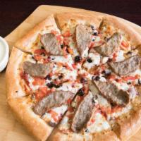 Greek Special Pizza · Onions, tomatoes, Greek feta, Greek olives and mozzarella topped with Greek gyro meat, serve...