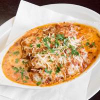 Lasagna · Pasta layered with house-made bolognese sauce, ricotta, provolone, Romano, Parmesan and mozz...