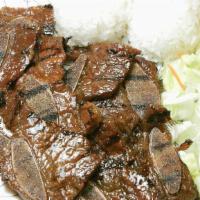Beef Short Ribs · Comes with steamed rice and salad.
