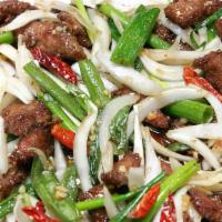 Mongolian Beef · Served with rice.