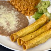Taquitos · Three corn tortillas, stuffed with chicken and fried until crispy. Served on a bed of lettuc...