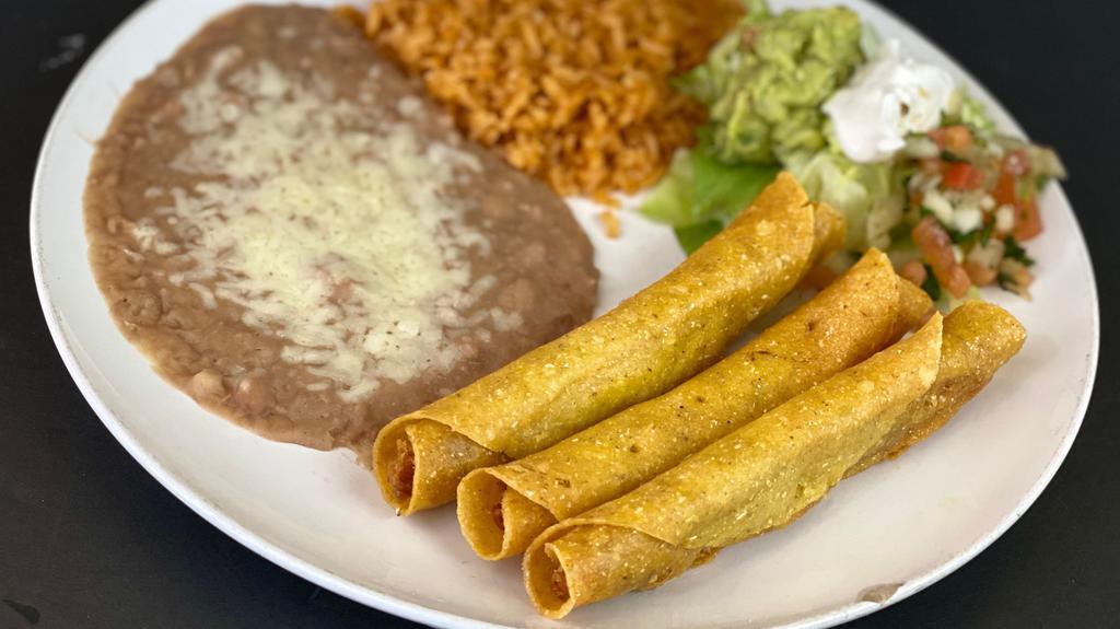 Taquitos · Three corn tortillas, stuffed with chicken and fried until crispy. Served on a bed of lettuce and topped with guacamole and sour cream. (no extra tortillas with this).