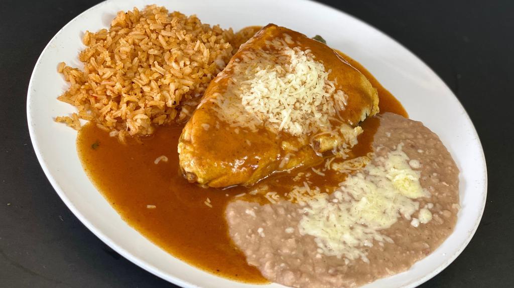 Chile Relleno · A poblano chile (sometimes it’s hot!), stuffed with jack cheese, dipped in an egg batter, and simmered in a tomato sauce.