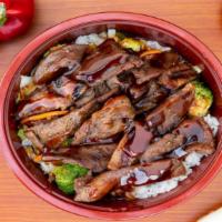 Beef Bowl · Beef teriyaki served bowl style with steamed rice and vegetables.
