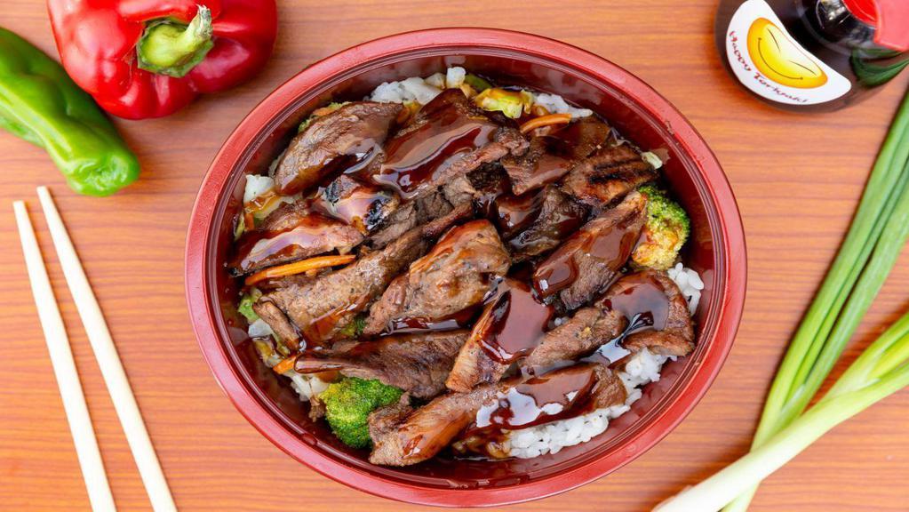 Beef Bowl · Beef teriyaki served bowl style with steamed rice and vegetables.