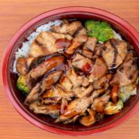 Pork Bowl · Pork teriyaki served bowl style with steamed rice and vegetables.