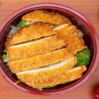 Chicken Katsu Bowl · Chicken Katsu bowl served with steamed rice and vegetables