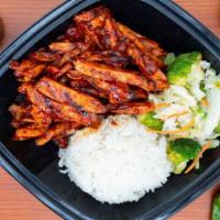 Spicy Chicken · Spicy Chicken Teriyaki with a side of rice and steamed vegetables.