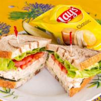 Albacore Tuna Sandwich · Made with water chestnuts. Choose one side, chips, potatoes or pasta salad.