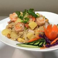 Hawaiian Fried Rice  · Stir-fried shrimp, calamari and bacon, onion, 
pineapple, and cashew nut