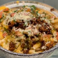 Loaded Fries · French fries loaded with your choice of meat, nacho cheese, beans, pico de Gallo, our avocad...