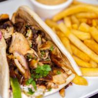 Chicken Gyro  · Tender Chicken seasoned with special herbs and spices – sliced and wrapped up in fresh and w...