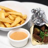 Falafel Sandwich · Sliced Falafel wrapped up in fresh and warm Pita Bread; served with Tzatziki, Tahini or Hot ...