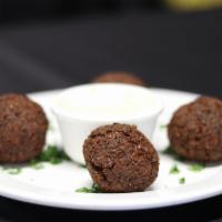 Falafel · Fried Pattie with a blend of vegetables and chickpeas. Served with Tahini Sauce