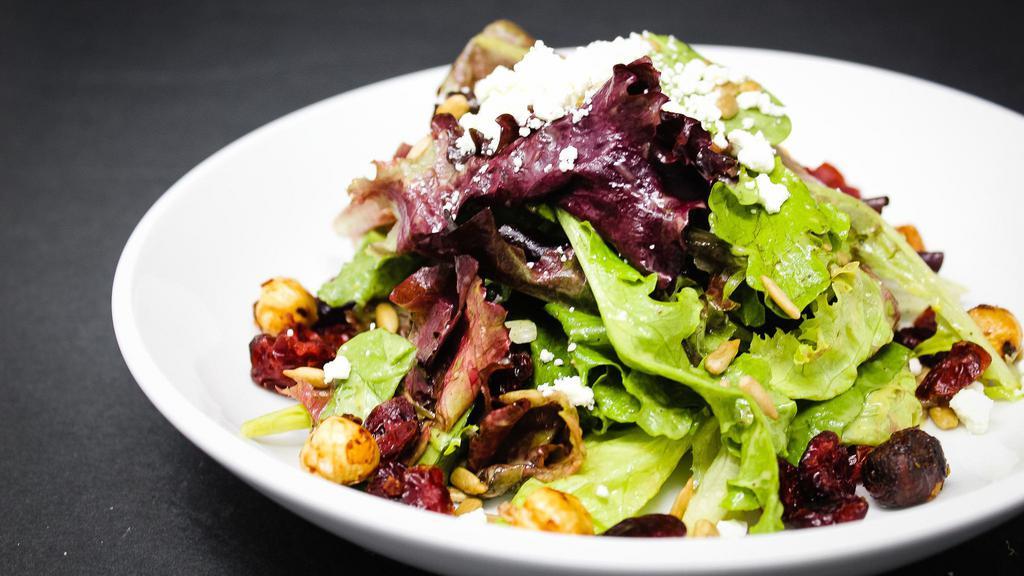 House Salad · mixed greens, spiced hazelnuts, dried cranberries, sunflower seeds; with choice of dressing, blue cheese, ranch or citrus vinaigrette.