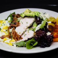 Chicken Cobb Salad · Chipotle-citrus-marinated chicken, mixed greens, avocado, fresh tomatoes, bacon, hard-boiled...