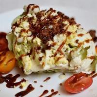 Bbq Bacon Wedge Salad · iceberg lettuce, bacon, fresh tomatoes, barbecue sauce, chopped egg, blue cheese crumbles, B...