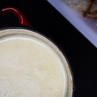 Oregon Black Truffle Fondue · traditional Swiss fondue finished with Willamette Valley black truffles and house-made oil.