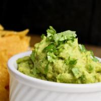 Guacamole · house made with avocado, lime, cilantro, house-made lime tortilla chips and salsa Choice of ...