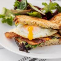 Egg-Cellent Sandwich · Whole grain bread, organic eggs, apple smoked bacon, scallion mayo, local organic greens.