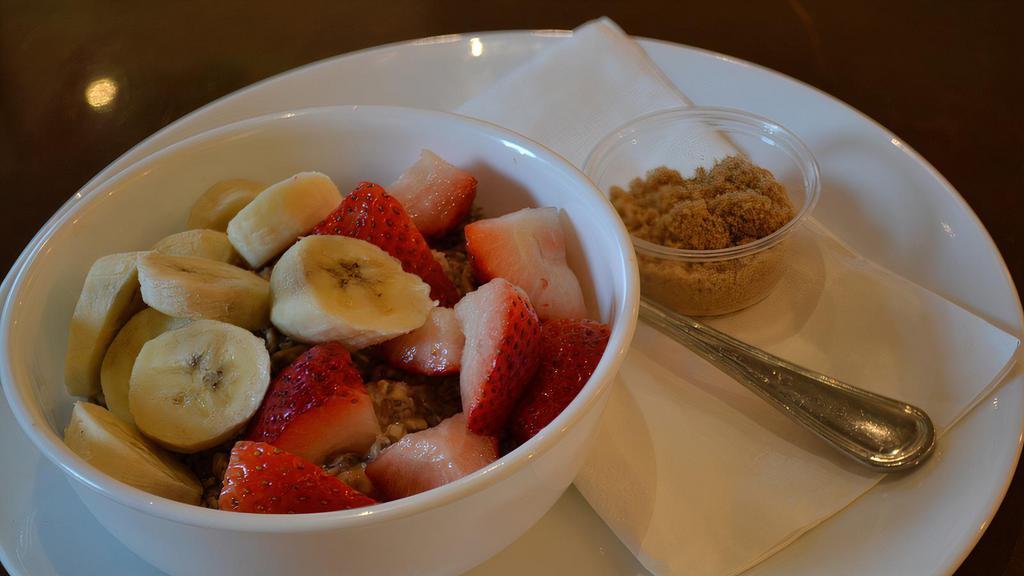 Oatmeal · Served with seasonal berries, banana, and brown sugar