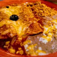 Traditional Enchiladas · Two corn tortillas rolled and stuffed with our homemade red chili sauce and blend of melted ...