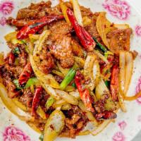Mongolian Beef · Beef cooked with Mongolian sauce and peppers, onions.  Medium spicy
