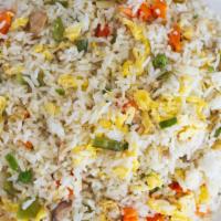 Vegetable Fried Rice  · Vegetable fried rice with egggs. Your options to adding pineapple or water chestnuts or jala...