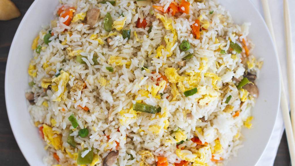 Vegetable Fried Rice  · Vegetable fried rice with egggs. Your options to adding pineapple or water chestnuts or jalapeños