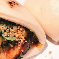 Pork Belly Bao · Pickled Mustard Greens, Cilantro, Crushed Peanuts.