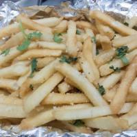 Garlic Parmesan Fries · French fries fried to golden perfection. Topped with garlic and parmasean . Served with our ...