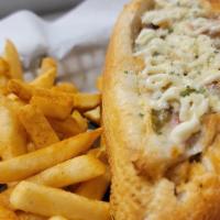 Chicken Philly Cheesesteak · Our amazing Philly recipe with a twist. Fresh cut mushrooms, bell pepper and onion sauteed w...