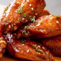 Chicken Wings · If you like it then you should put a wing on it.

 Choose your size, choose you sauce and  y...