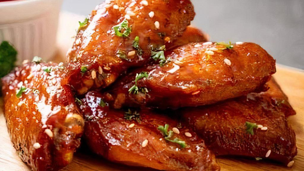 Chicken Wings · If you like it then you should put a wing on it.

 Choose your size, choose you sauce and  your side and yes we will add extra napkins, because you are going to devour these bad boys.