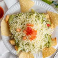5 Rolled Tacos · With guacamole, lettuce, tomato and cheese.