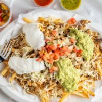 Carne Asada Fries · With beans, pico, guacamole, cheese and sour cream.
