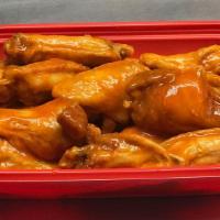 25 Traditional Wings · Comes with three sauces.