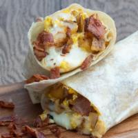 Bacon, Potatoes, & Eggs Burrito · El Jefe Breakfast Burritos favorite: Flour tortilla filled with bacon, eggs, potatoes, and M...