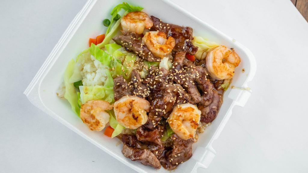 Beef And Shrimp Teriyaki Combo · The combo meal comes with Beef and Shrimp Teriyaki, 2 pieces of Spring Roll and a choice of Soda.