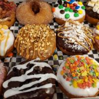 Assorted Fan Favorite Dozen · Whether you just can't decide or it's your first time in, we've got your sweet tooth and wil...