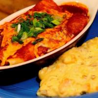 Enchiladas · Two corn tortilla enchiladas, baked with smokey red sauce + a blend of cheeses, topped with ...