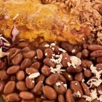 Chile Relleno · Roasted Anaheim Chile, filled with jack, lightly egg battered, covered in mild red sauce + c...