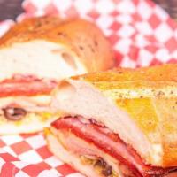 Italian Grinder · Coronado Salami & Pepperoni and Farmhouse Smoked Ham with tomatoes, red onions, olives, pepp...