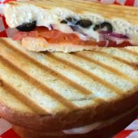 Grilled Mini Veggie - Vegetarian · Provolone cheese, tomatoes, onions, and black olives. Served on grilled sliced French bread.