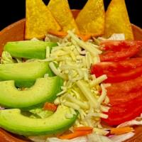 Mexican Salad · Mixed crispy lettuce, Avocado, Tomatoes, Cheese, Citrus Vinaigrette, Tortilla Chips